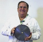 tom-sawblade-small-revised.jpg Tom With His Patented Saw Blade